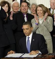 U. S. President Barack Obama signs the Patient Protection and Affordable Care Ac