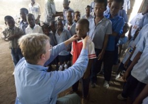 Dr Fredrik checks a boy for goiter
